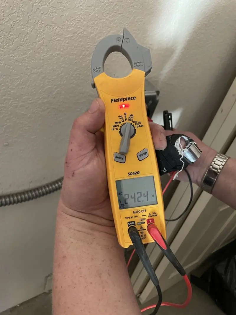 Voltage testing with clamp meter during Circuit Breaker Repair in Sebring